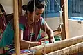 Handloom weaver at work