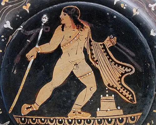 Dionysus holding his thyrsus. Detail of the tondo of a Paestan red-figure footless kylix, ca. 360–350 BC.
