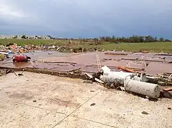 EF5 damage example--There are no remains of the structure. Not even the foundation of the structure remains, just the slab. Debris at the site of the impact is also minimal due to the extreme wind speeds of an EF5 tornado.