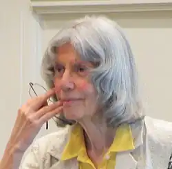 Photo of a woman with long grey hair
