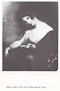 Seated woman, looking toward her left at artist, perhaps when interrupted while reading