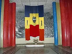 "Empty" Romanian flags with the communist insignia cut out, on the model of the Hungarian flags, pierced in the Revolution of 1956, from an exhibit at the Military Museum, Bucharest