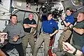 STS-134 and Expedition 27 crew inside the Harmony node shortly after docking.