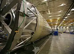 The SpaceX Falcon 9 booster in a hangar.