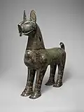 "A demonstration of the excellence achieved in metalwork under the Seljuqs": bronze incense burner shaped like a lion, with removable head, dated 1181–1182 CE, Taybad, Iran. (Metropolitan Museum of Art)[181][182]
