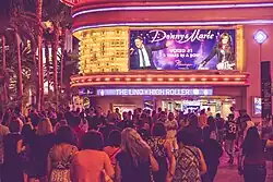 A digital marquee, displaying pictures of Donny and Marie Osmond with the text "Donny & Marie, voted #1 3 years in a row".