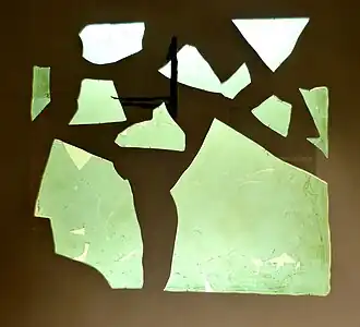 Fragment of a Roman window glass plate dated to 1st to 4th century CE. Note the obvious curvature; this is not a flat pane