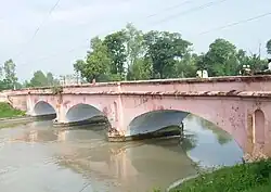 Photograph (2008) of an East India Company-era (1854) bridge on the Ganges Canal near Roorkee, Uttar Pradesh, India.