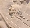 Mother Teresa, wearing the habit of the Missionaries of Charity, gazes up to the Holy Spirit appearing as a white dove, as rays of light shine upon her.