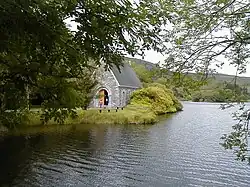 St Finbar's church, located on Gougane Barra, a 6th century monastery site.[42]