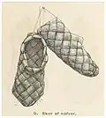 A pair of Finnish traditional shoes woven from strips of birch bark