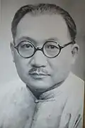 Chinese man wearing a tangzhuang