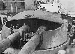 Two-gun turret with front section of armoured roof missing