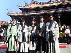 Men wearing shenyi, Panling Lanshan, and zhiduo, date unknown.