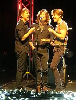 Hanson performing in 2013