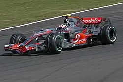 A racing car going around a corner