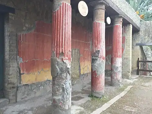 Columns from the House of the Relief of Telephus at Herculaneum, with preserved red paint
