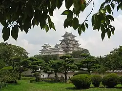 A view of keeps and the lush castle grounds below