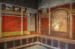 A room featuring various frescos