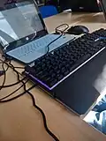A HP laptop connected to a keyboard