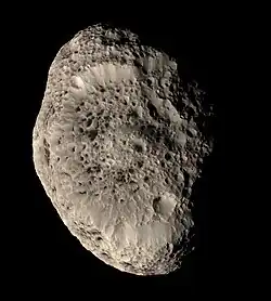 The chaotic rotation of Hyperion. The Solar System as a whole is full of examples of dynamical systems from Celestial mechanics