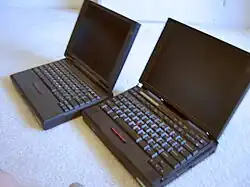 An IBM ThinkPad 310ED and a 760ED, both from the 1996–97 era. The 760ED boasts the unique flip-up keyboard that was standard on all 760 ThinkPads.
