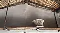 Ashram with folk architectural elements with wood and bamboo roof