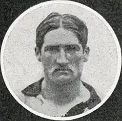 A black and white photography of a light-skinned man.