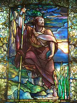 A window by Tiffany illustrating the development and use of multi-coloured flashed, streaky glasses at the end of the 19th century.