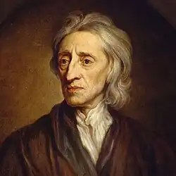 Oil painting of a man with gray hair wearing a brown attire