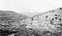 Rocky hillsides and village