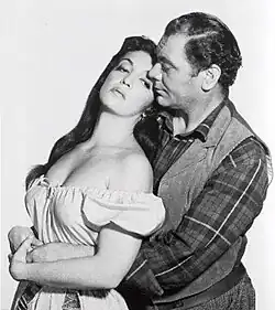 Black and white film still showing Katy Jurado with Ernest Borgnine