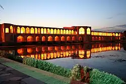 Khaju Bridge at twilight, with arches illuminated