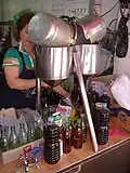 Bottling sesame oil at Moran Market, Seongnam, South Korea