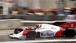 Niki Lauda driving a red-and-white McLaren MP4-2