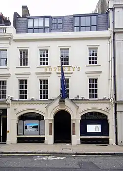A four-storey Georgian building with the name Sotheby's on the front