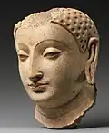 Head of Buddha, from Hadda, Afghanistan, c. 5th–6th century. Metropolitan Museum of Art.[454]