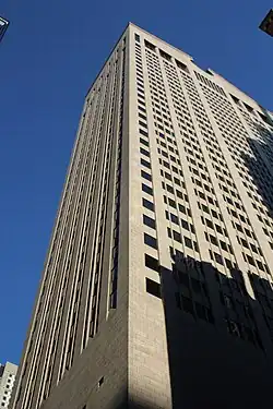 The southern and eastern elevations of the facade as seen from the corner of Madison Avenue and 55th Street, looking up
