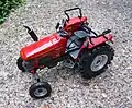 A scale model of a modern Ursus and Fendt tractor in Germany