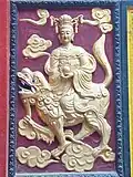 Mañjuśrī on lion with cintamani. Quan Am Temple, Ho Chi Minh City.