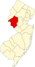 A county in the west part of the state, just north of the divide between north and south. It is averagely sized.