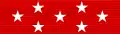 Red ribbon with seven white stars: a row of three stars across the center, and rows of two stars above and below