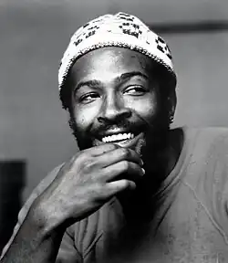 Picture of Marvin Gaye wearing a white hat with a slight smile