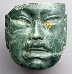 Olmec jade mask, 10th–6th century BCE, jadeite, height: 17.1 cm (63⁄4 in.), width: 16.5 (65⁄16 in.), MET