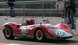Orange McLaren M1A sports car