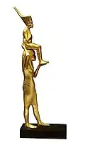 Gilded wooden statue of Tutankhamun being carried by the goddess Menkeret. It was looted during the 25 January 2011 Revolution and is still missing since.
