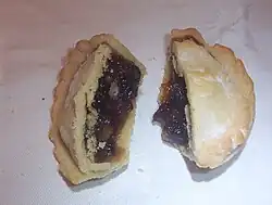 Baked mince pie, cut in half