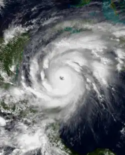 Satellite image of Hurricane Mitch over the Western Caribbean Sea with a large and well-defined eye