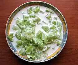 As a side dish with yoghurt, raita or mizeria