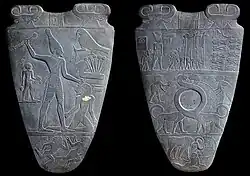 The Narmer Palette, c. 3100 BCE, which already shows the canonical Egyptian profile view and proportions of the figure